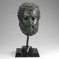 Bronze bust depicting a bearded gentleman on marble base 20th c green patina unsigned 21