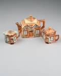 A Three Piece English Cottage Ware Pottery Set