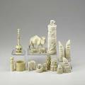 Ivory grouping sixteen pieces include carved camel elephant netsuke monkey carved teeth etc 20th c largest 7