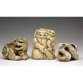 Japanese ivory netsuke growling tiger shoki holding an oni and a sword and tightly coiled snake 19th20th c tiger signed meizan tallest 1 34