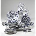 Meissen assembled blue onion china grouping includes dinner luncheon plates and dessert plates oval square and round platters chop plate gravy and sauce boats butter pats coasters sugar bowl