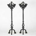 Pair of wrought iron torcheres gargoyle decoration electrified 20th c 93 x 27 dia