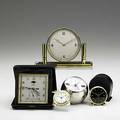 Dresser and travel clocks grouping of five 20th c two by tiffany  co van cleef and arpels gubelin and angelus largest 5 34 x 4 18 x 1 34