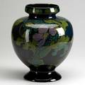 Gouda vase decorated in the style of rozenburg 20th c marked 12 12 x 10