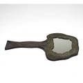 Arts  crafts hand mirror with treeshaped handtooled leather frame probably contemporary 16 x 10