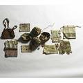 Arts  crafts textiles twelve purses or bags all with embroidered decoration most fabric and one leather largest 14 x 10 12