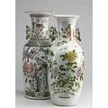 Two chinese floor vases one decorated in court scene the other floral 19th20th c taller 23 12
