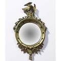 Bullseye mirror gesso frame with eagle finial 20th c 38 x 19 12 dia