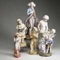 Bisque figurines six porcelain pieces young gentleman young boy holding puppies young girl holding kitten young peasant girl cleaning young couple marked dresden and woman with cherub 19th20t