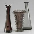 Italian glass three vases cased glass flaring with controlled bubbles and gold foil and grey beaker shaped vase tallest 12