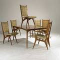 Vladimir kagan dreyfuss six walnut cane and upholstered dining chairs and bookmatched walnut dining table three inserts unmarked armchair 41 x 24 x 24 table 29 x 63 x 40 and inserts