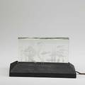 Etched glass luminaire depicting fish in an aquarium in ebonized wood base unmarked 6 14 x 10 78 x 3 12