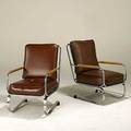 Art deco pair of chromed steel leatherette and wood cantilevered lounge chairs unmarked 35 x 23 x 32