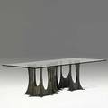 Paul evans sculpted bronze and glass dining table on serpentine base 1973 signed pe 73 28 34 x 96 x 48