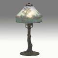 Handel bronze and glass boudoir lamp the acidetched shade obverse and reversepainted with trees in a landscape over tree trunk base base stamped handel shade painted handel 6232 14 x 7