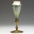 Tiffany studios floriform favrile glass vase in silvered bronze base replaced contemporary glass liner base marked tiffany studios new york 1743 tcdco cup unmarked 14 14 x 5 12
