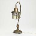 Austrian secessionist lamp brass and copper in beanstalk form arm terminating in a lantern 6 x 23 12 x 10 12