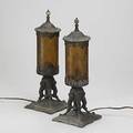 Egyptian revival pair of cylindrical boudoir lamps in cold painted white metal with amber glass inserts ml co 18 x 6 12 sq