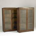 Style of stickley bros pair of twodoor bookcases each with three adjustable shelves and gallery top 51 12 x 35 x 12