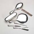 Sterling dresser set seven pieces mirror two brushes comb file buttonhook shoehorn ca 1910 longest 10