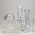 Decorative glass twentyfour pieces include two dorothy thorpe etched vases cut and pressed glass and champagne flutes tallest 11