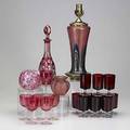 20th c art glass grouping twenty pieces include pulled glass lamp base short lobed vase eight ruby juice glasses on clear bases etc tallest 18
