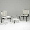 Outdoor furniture pair of side chairs and an occasional table with enameled metal frames and rubber weave upholstery unmarked chairs 33 x 19 x 22