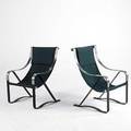 John mckay pair of cantilevering chromed and enameled steel armchairs 36 x 25 x 24