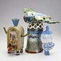 Studio ceramics three sculptures fly jar signed dorrance 73 radio sculpture signed salustri 1973 and blue man illegibly marked some chips on fly jar fly jar 18 x 23 12 x 16