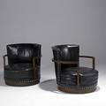 Style of paul frankl pair of leather walnut and nickel studded club chairs ca 1920 unmarked 29 12 x 30 12 x 32