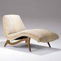 Style of vladimir kagan fabricupholstered chaise lounge on sculpted walnut base 32 x 32 x 47