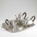 Gion portuguese 916silver coffee service porto 19381984 three halfreeded cushionshaped vessels on ball and paw feet shaped rosewood handles 8 34 coffee pot 7 tea pot 5 cream pitcher 202