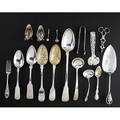 Silver serving pieces seventeen pieces 18081940 9 34 cake server by paul petersen canada 12 stuffing spoon by crossley and smith london 1808 2 9 14 berry spoons by t cox savory london
