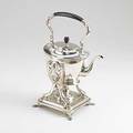 Tiffany  co silver kettle on stand 1894 oval form with reeded border and ring foot gooseneck spout swing handle issues from shell terminus ebony grip and finial square stand on four pawfeet