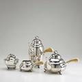 Silver and ivory coffee service by hamilton ny fourpiece service in lotus designed in the jensen style retailed by macys during the 1940s four bulbous vessels with fluted paw feet and ivor