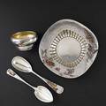 Four pieces of aesthetic period mixed metal spothammered sterling with applied motifs ca 188090 gorham swan and marshland bowl 6 38 and cherry handled spoon 6 12 whiting insect and fish bo