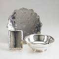 Tiffany  co and other american silver ringfooted centerbowl tiffany  co makers 1911 edwardian charger with applied scroll edge raised and chased foliate decoration and ring foot made for tiff