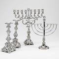 20th century silver and plate judaica silver menorahs and plated candlestands 20th c both eightbranch menorahs with shammash the larger with oil pitcher 385 ot silverplated candlestands marked