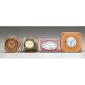 Four ornamental desk clocks 19001940 french agate on bronze dore french rose guilloch and white enamel marked for je caldwell on bronze dore swiss pink guilloche and black enamel bronze dore s