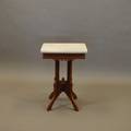 An Eastlake Walnut Marble Top Side Table