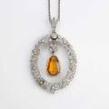 Edwardian diamond and topaz platinum necklace oval pendant in the garland style suspends central pearshaped precious topaz 134mm x 89mm pendant 2 x 1 14 chain 18
