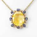 Yellow and blue sapphire diamond necklace faceted oval cut yellow sapphire 226 x 210 x 834 mm approx 28 cts framed by 8 oval faceted blue sapphires approx 5 cts tw and diamond melee approx