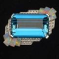 Raymond yard aquamarine and opal fur clip c 1938 art deco architectural form emerald cut aquamarine 30 x 19 x 117 mm approx 34 cts bordered by rows of diamonds and keystoneshaped opal corner