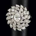 Diamond platinum cocktail ring ca 1960 oval bombe centers oval cut diamond approx 75 ct and three tiers of marquise cut diamonds approx 2 cts tw 143 gs size 9 12