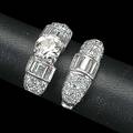 Art deco diamond and platinum wedding set ca 1935 transitional cut diamond 94 ct by formula in tapered bombe with companion band bead set circularcut and channels of baquettecut diamonds approx