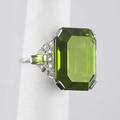 Art deco peridot diamond platinum ring emerald cut peridot 359 cts to baguette cut peridot and halfmoon diamond cluster shoulders 16 gs size 6 14