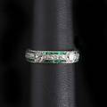 Art deco diamond emerald platinum band endless design five octagonal set oec diamonds interrupted by bands of diamond melee and channels of calibre emeralds engraved edges diamonds 95 cts tw 4