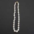 White south sea pearl necklace thirtyfour graduated spherical and semispherical pearls 134mm 92mm fluted 18k clasp 16 12