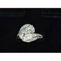 Diamond platinum bypass ring ca 1950 two brilliant cut diamonds 225 cts tw by formula channels of baguette cut diamonds and rows of single cut diamonds approx 62 ct tw estimated diamonds