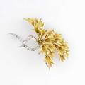 Diamond and 18k gold brooch ca 1960 textured 18k yg leaves and entwined wg ribbons brilliant cut diamonds approx 150 cts tw 30 gs 2 12